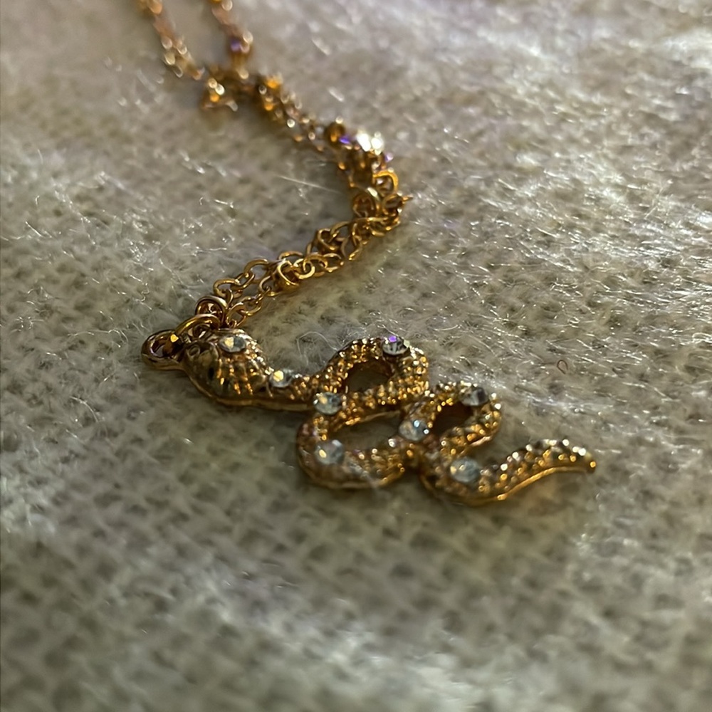 Stone encrusted snake necklace
